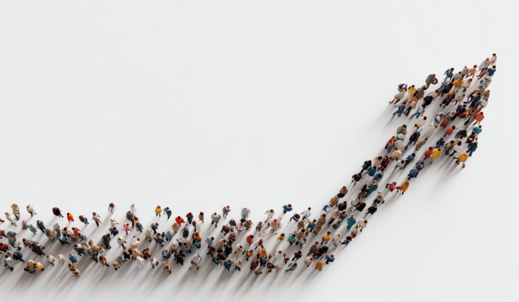 High angle view of a group of people position to form an arrow.
