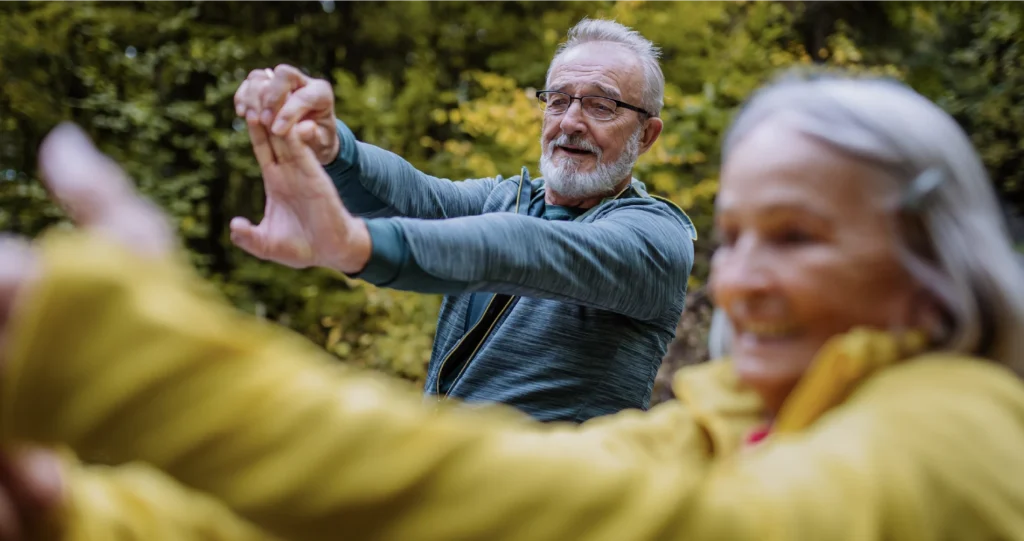 Retirees stretching in the park
